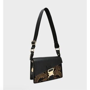 Tote&Carry Black and Gold Crossbody Bag